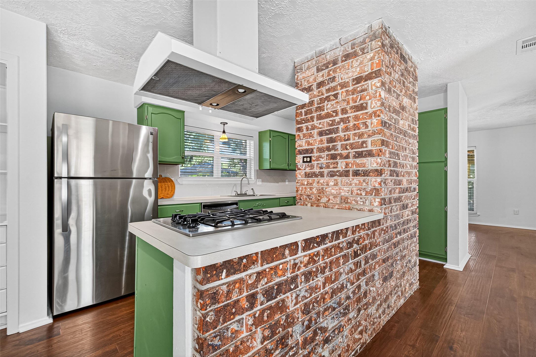 12910 Aste Lane Houston, TX 77065 - Photo 17 of 37 a kitchen with stainless steel appliances granite countertop a refrigerator and a stove