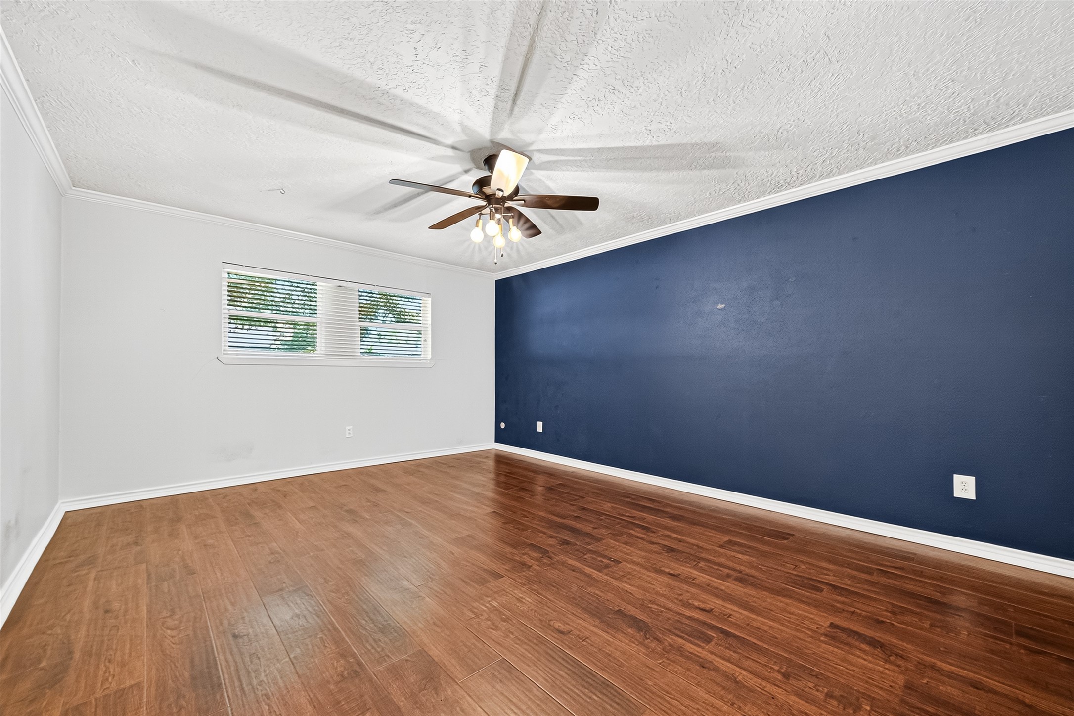 12910 Aste Lane Houston, TX 77065 - Photo 26 of 37 a view of an empty room with a window