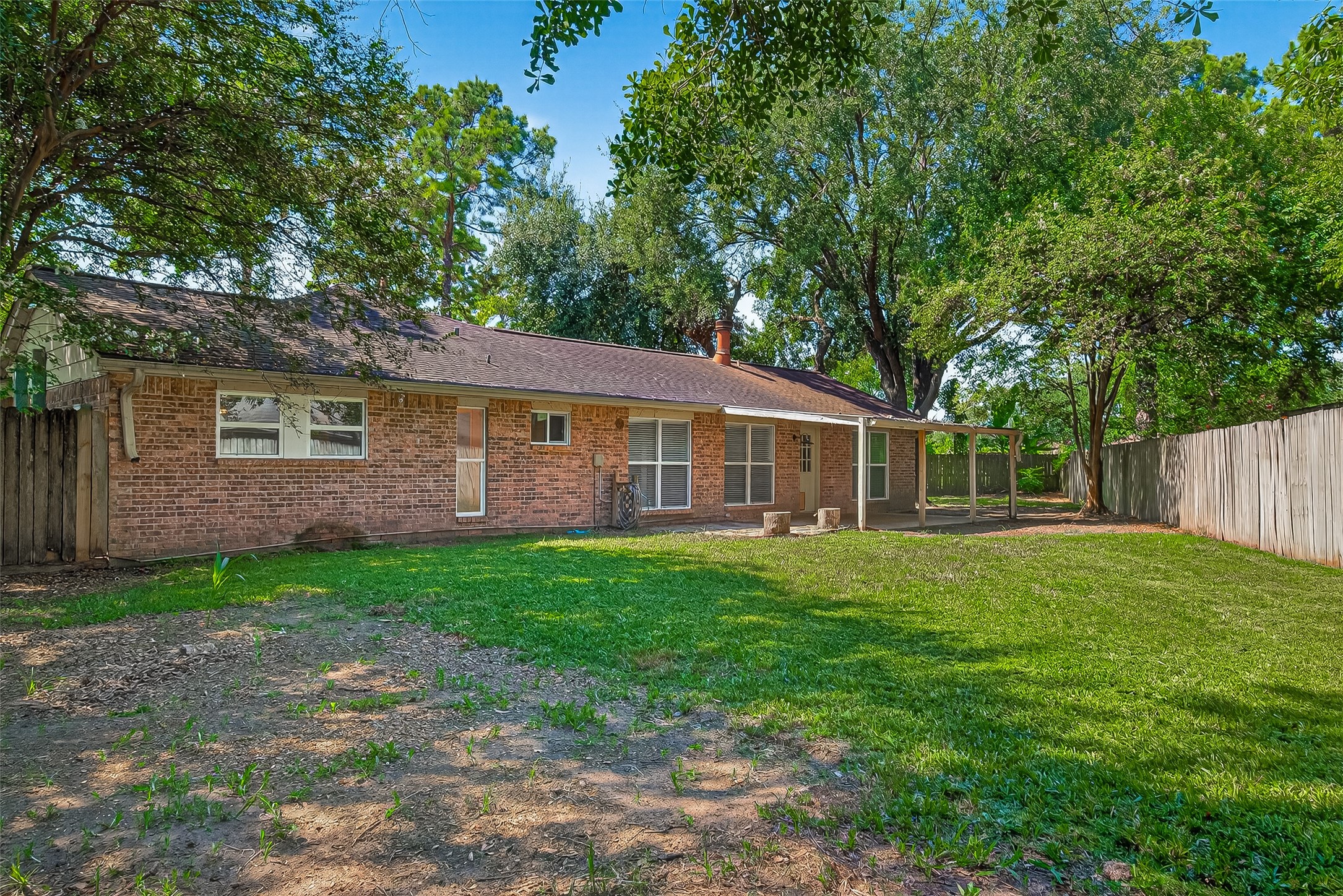 12910 Aste Lane Houston, TX 77065 - Photo 33 of 37 a view of a house with backyard