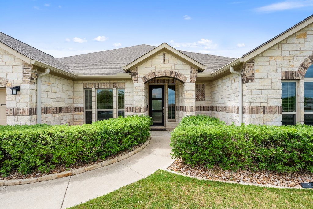 191 Tabago Court Austin, TX 78737 - Photo 1 of 40 front view of a house with a yard