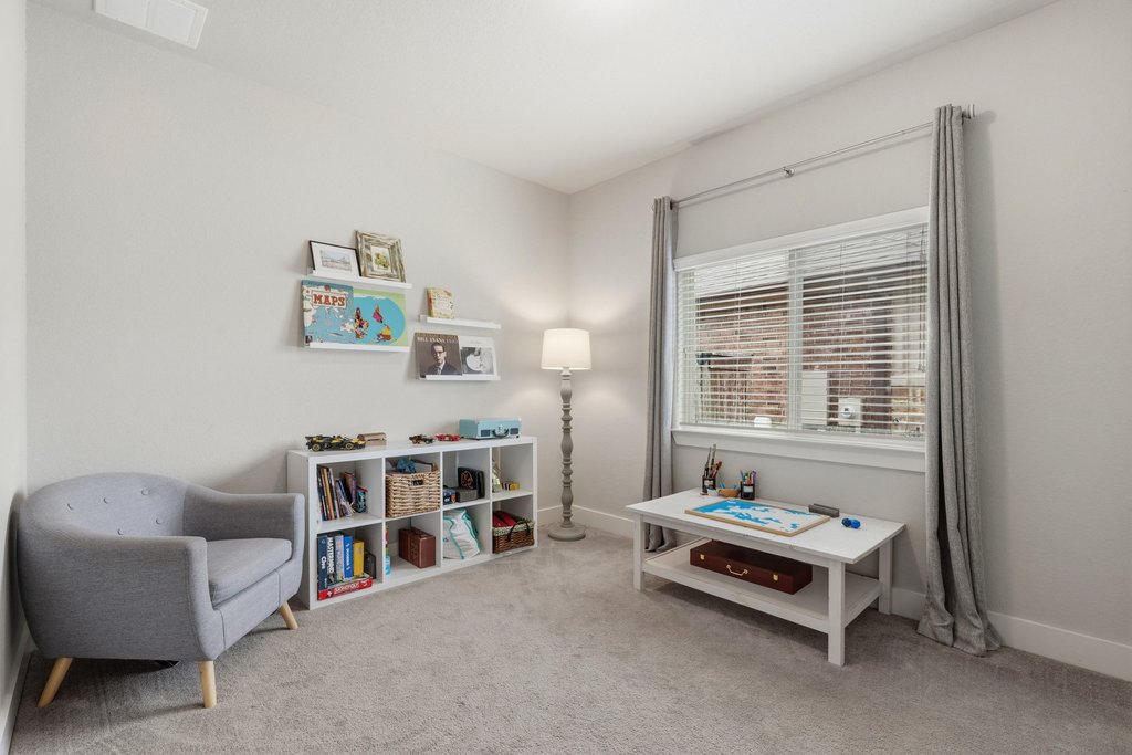 191 Tabago Court Austin, TX 78737 - Photo 23 of 40 a living room with furniture and a window