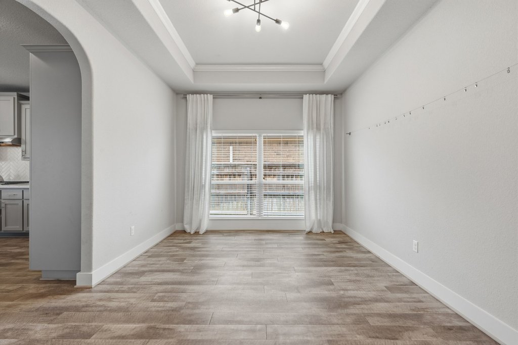 191 Tabago Court Austin, TX 78737 - Photo 25 of 40 an empty room with a empty space and windows