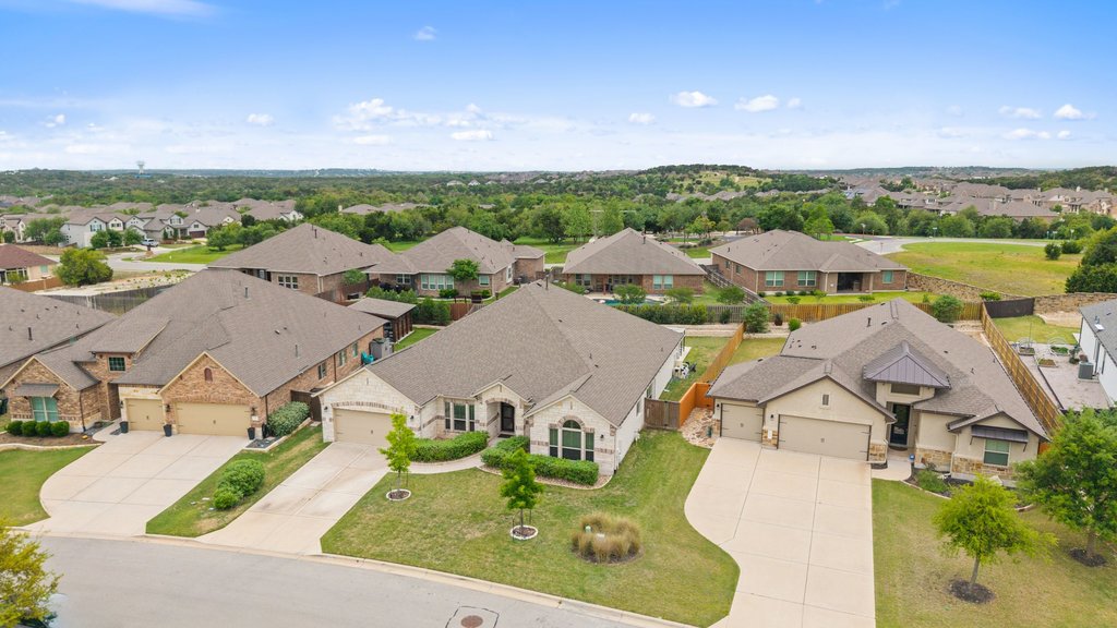 191 Tabago Court Austin, TX 78737 - Photo 36 of 40 an aerial view of residential houses with outdoor space and ocean view