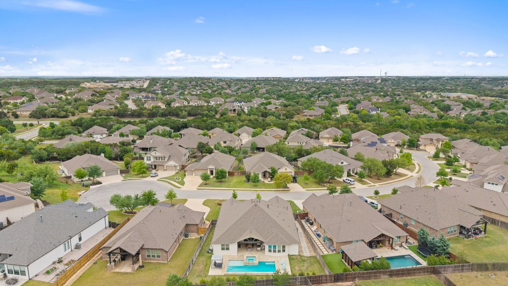 191 Tabago Court Austin, TX 78737 - Photo 37 of 40 an aerial view of residential houses with outdoor space and street view
