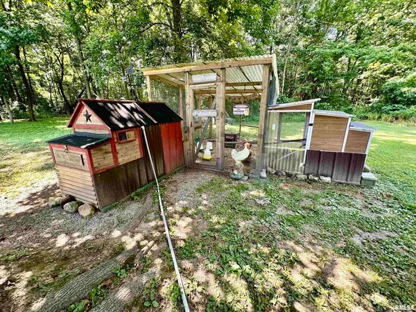 a view of outdoor space with deck and yard
