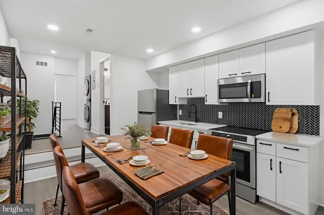 a view of a dining room with furniture