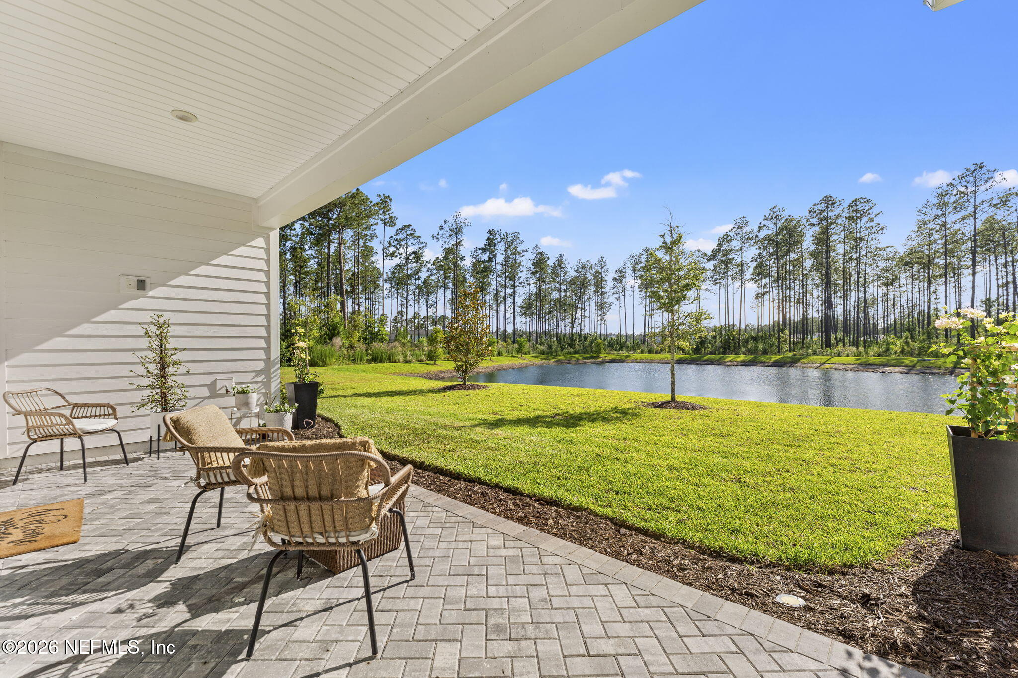 101 Elm Br Road St. Johns, FL 32259 - Photo 44 of 77 a view of a swimming pool with a lawn chairs and a fire pit