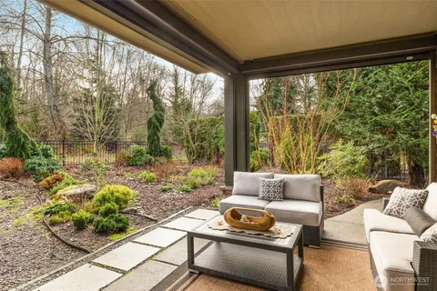 a outdoor living space with furniture and garden view