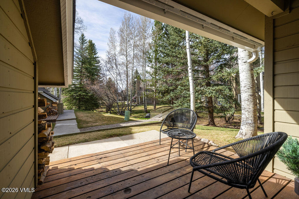 570 Homestead Drive, Unit 41 Edwards, CO 81632 - Photo 17 of 28 a view of a chair and tables in the balcony
