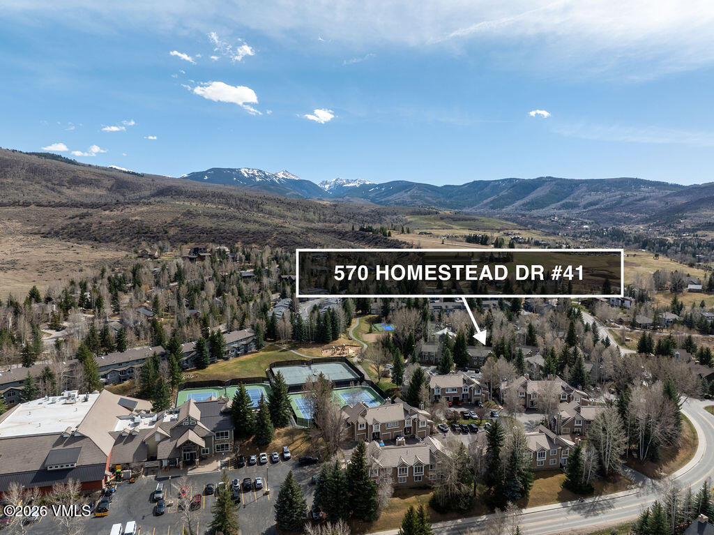 570 Homestead Drive, Unit 41 Edwards, CO 81632 - Photo 23 of 28 a view of a house with a yard