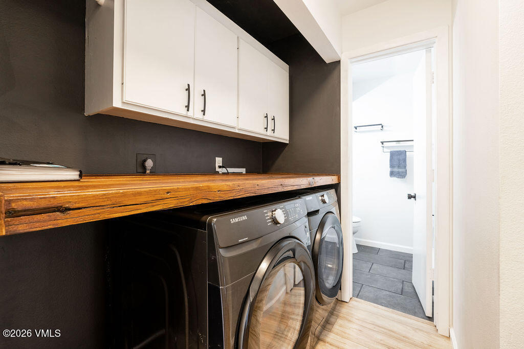 570 Homestead Drive, Unit 41 Edwards, CO 81632 - Photo 8 of 28 a utility room with stainless steel appliances granite countertop a sink a washer and dryer