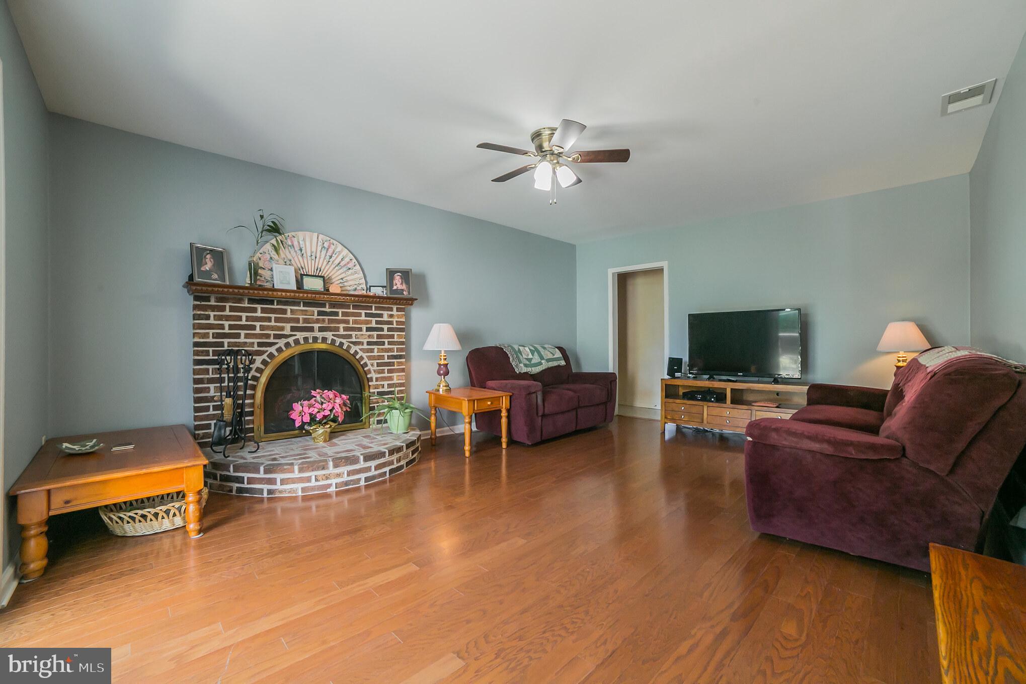 2483 Trewigtown Road Colmar, PA 18915 - Photo 10 of 35 Family room with wood burning fireplace