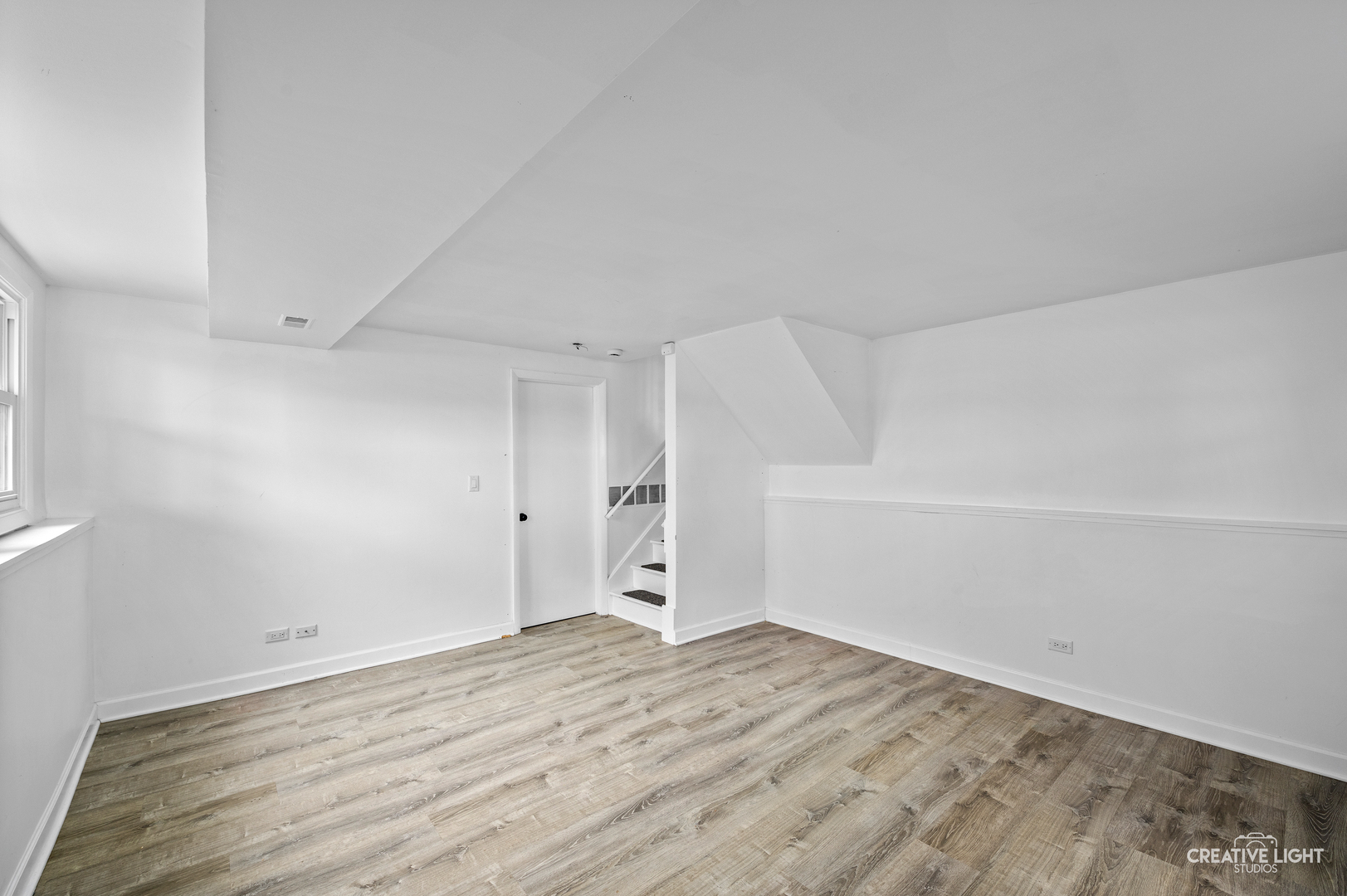 110 Delaware Drive Bolingbrook, IL 60440 - Photo 13 of 15 a view of empty room with wooden floor