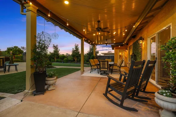 a kitchen with stainless steel appliances a stove a sink and a refrigerator