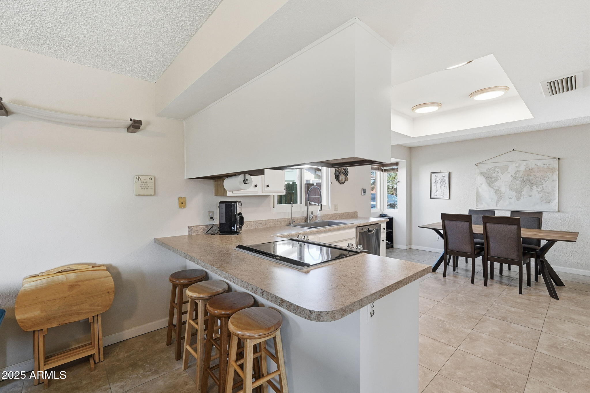 1504 North Iowa Street Chandler, AZ 85225 - Photo 12 of 34 a dining room with furniture and window