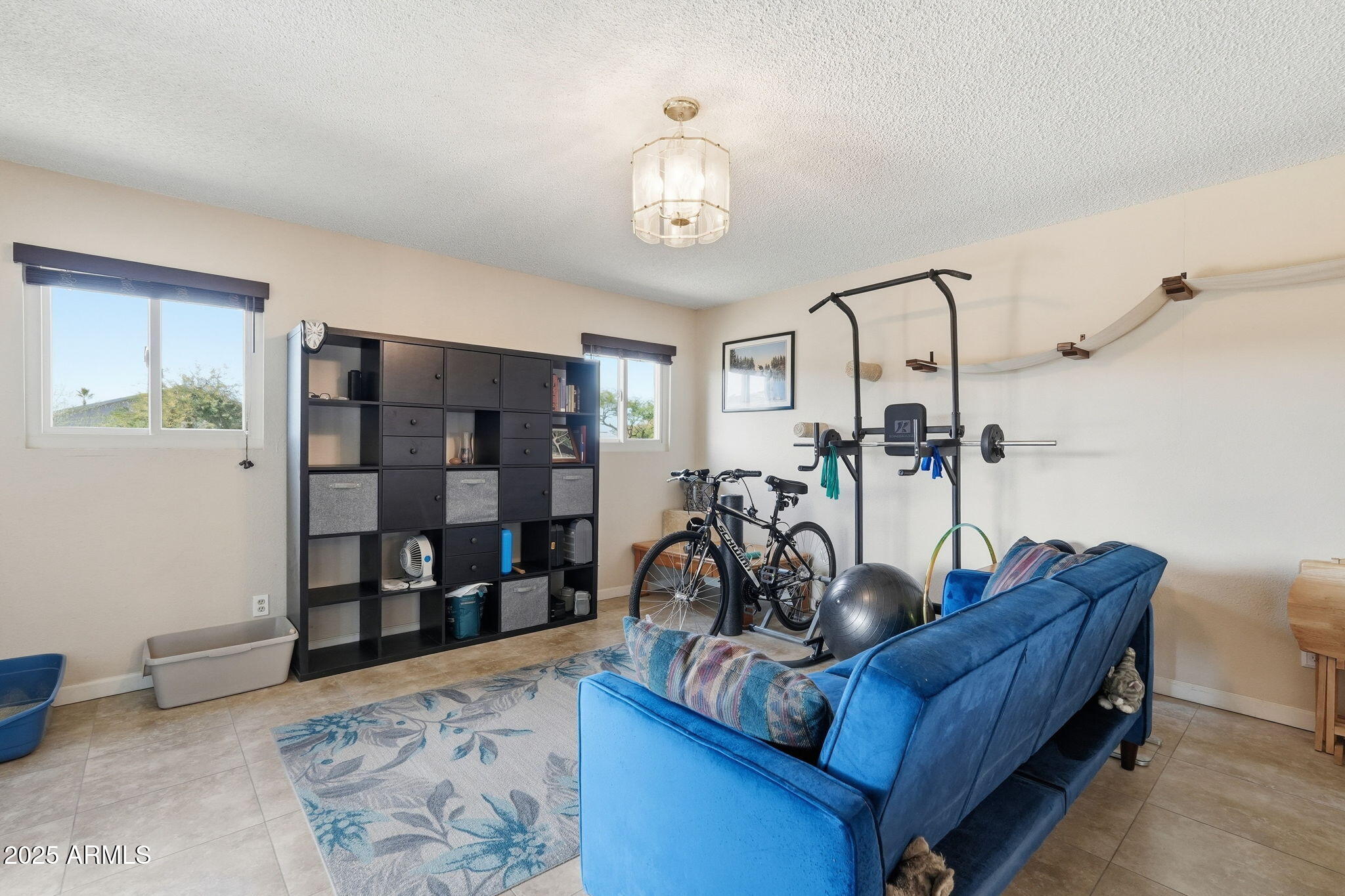 1504 North Iowa Street Chandler, AZ 85225 - Photo 16 of 34 a view of a room with gym equipment