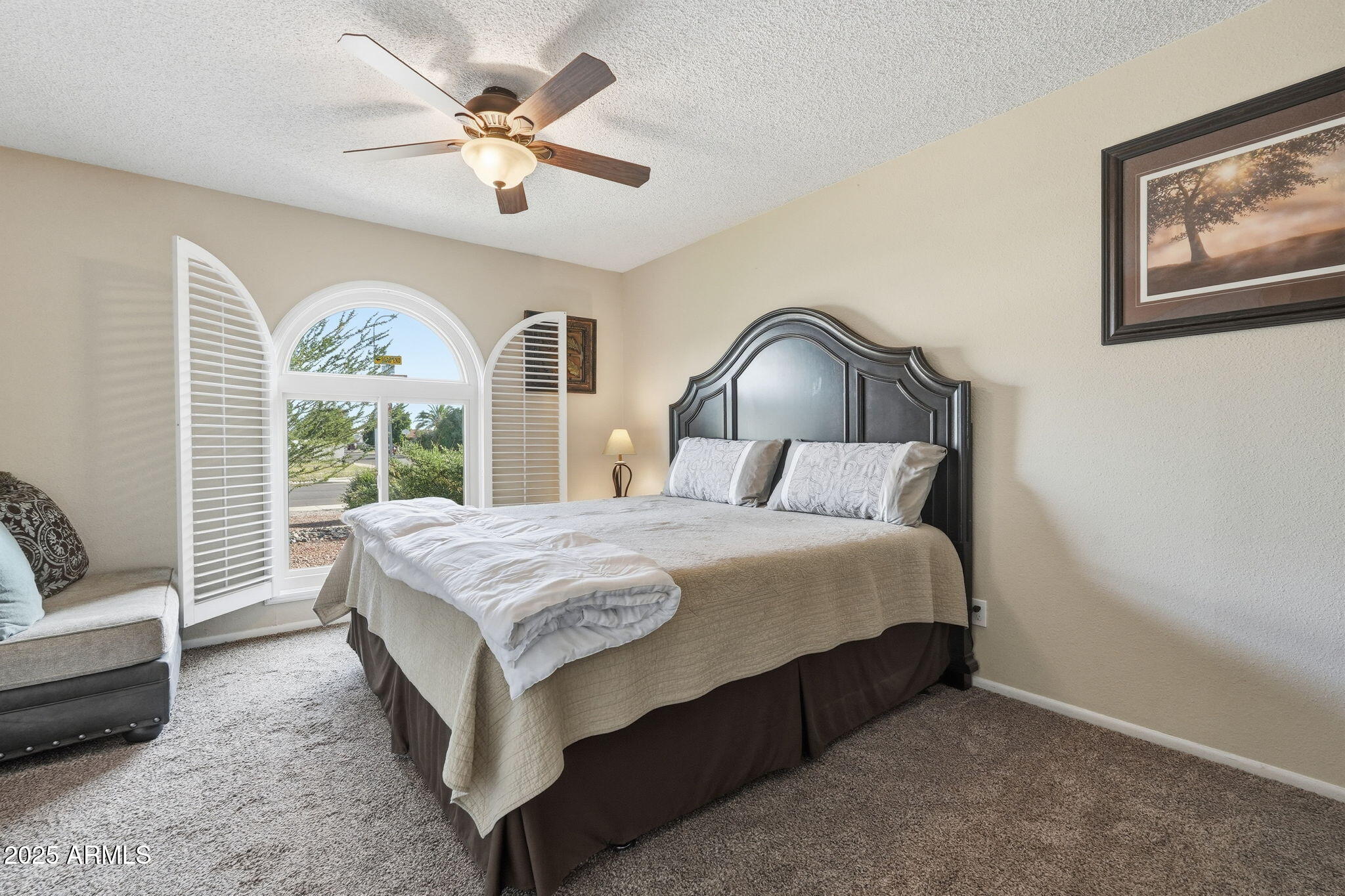 1504 North Iowa Street Chandler, AZ 85225 - Photo 23 of 34 a bedroom with a bed mirror and a large window