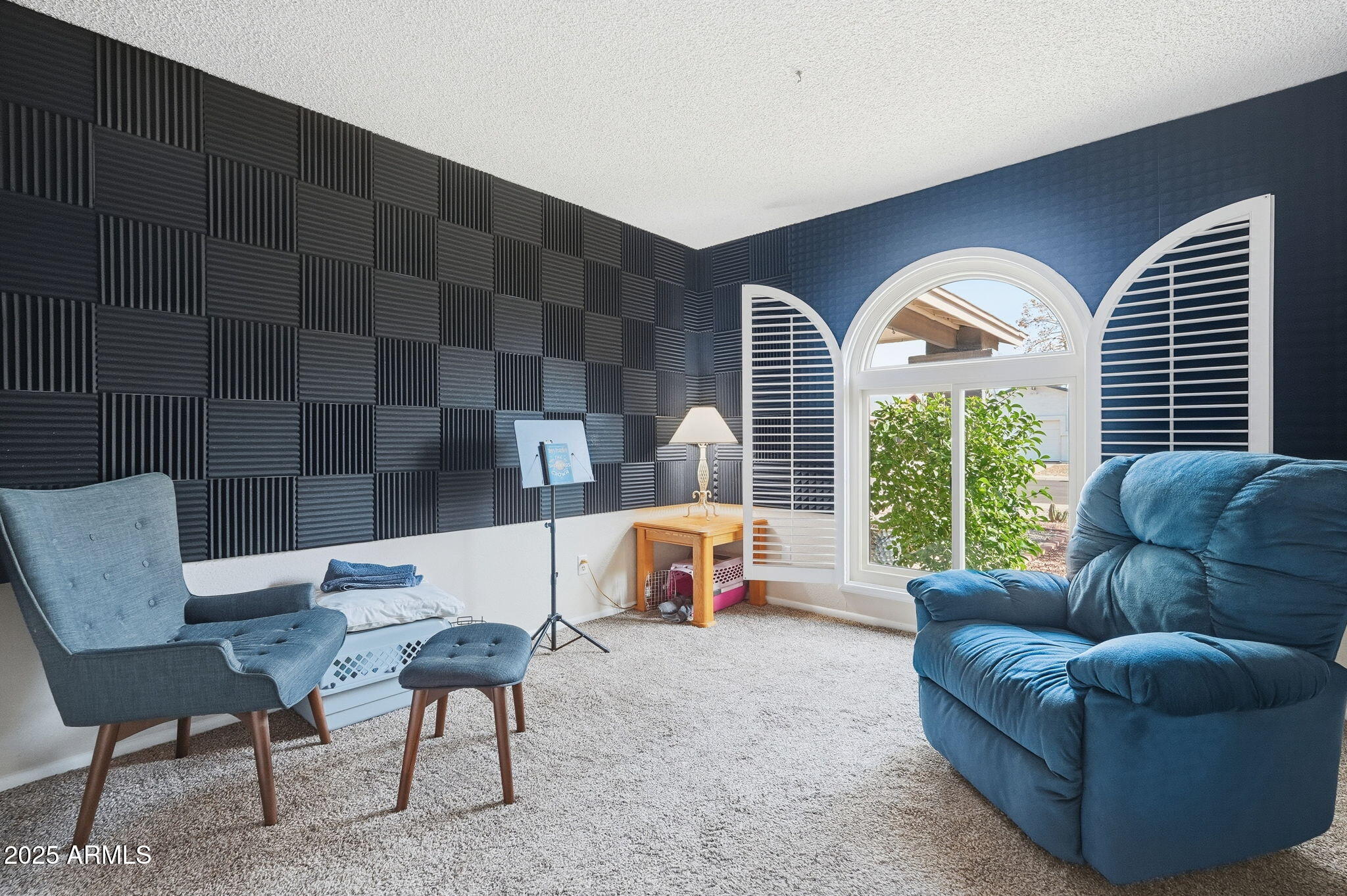 1504 North Iowa Street Chandler, AZ 85225 - Photo 26 of 34 a living room with furniture and a large window