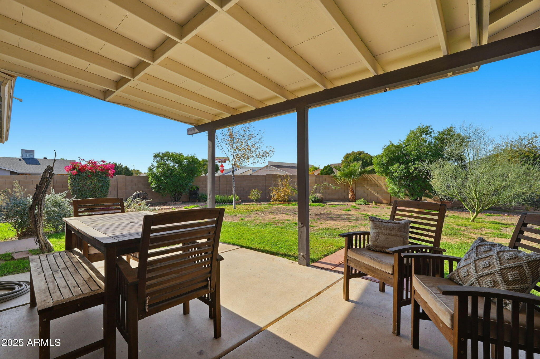 1504 North Iowa Street Chandler, AZ 85225 - Photo 30 of 34 a view of an outdoor sitting area with furniture and umbrella