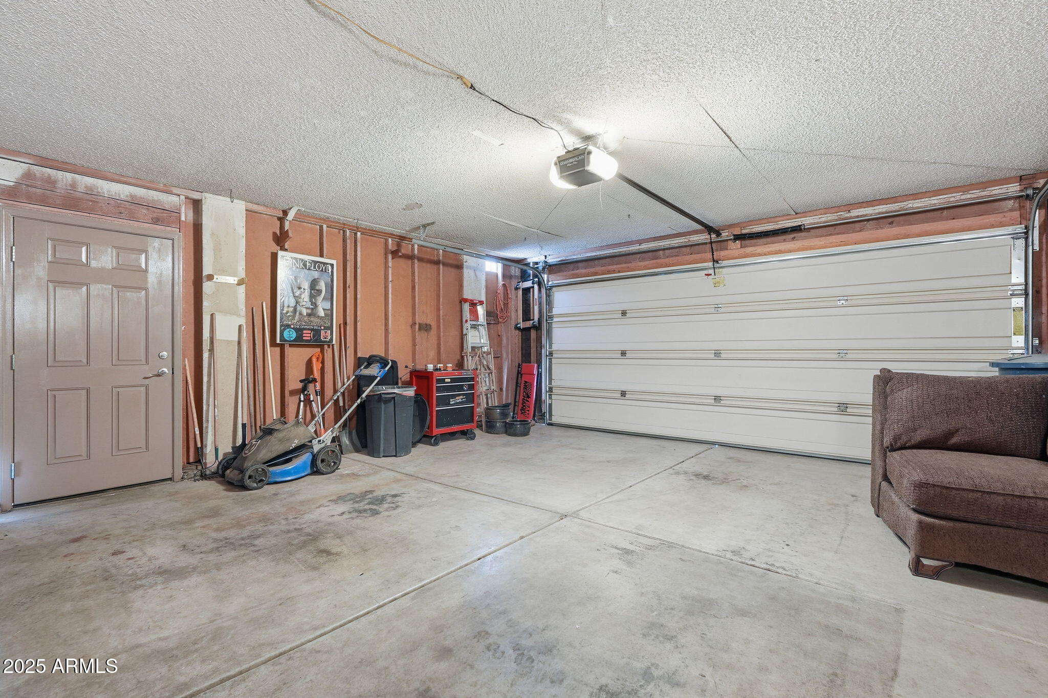 1504 North Iowa Street Chandler, AZ 85225 - Photo 33 of 34 a view of a big room with furniture and a ceiling fan
