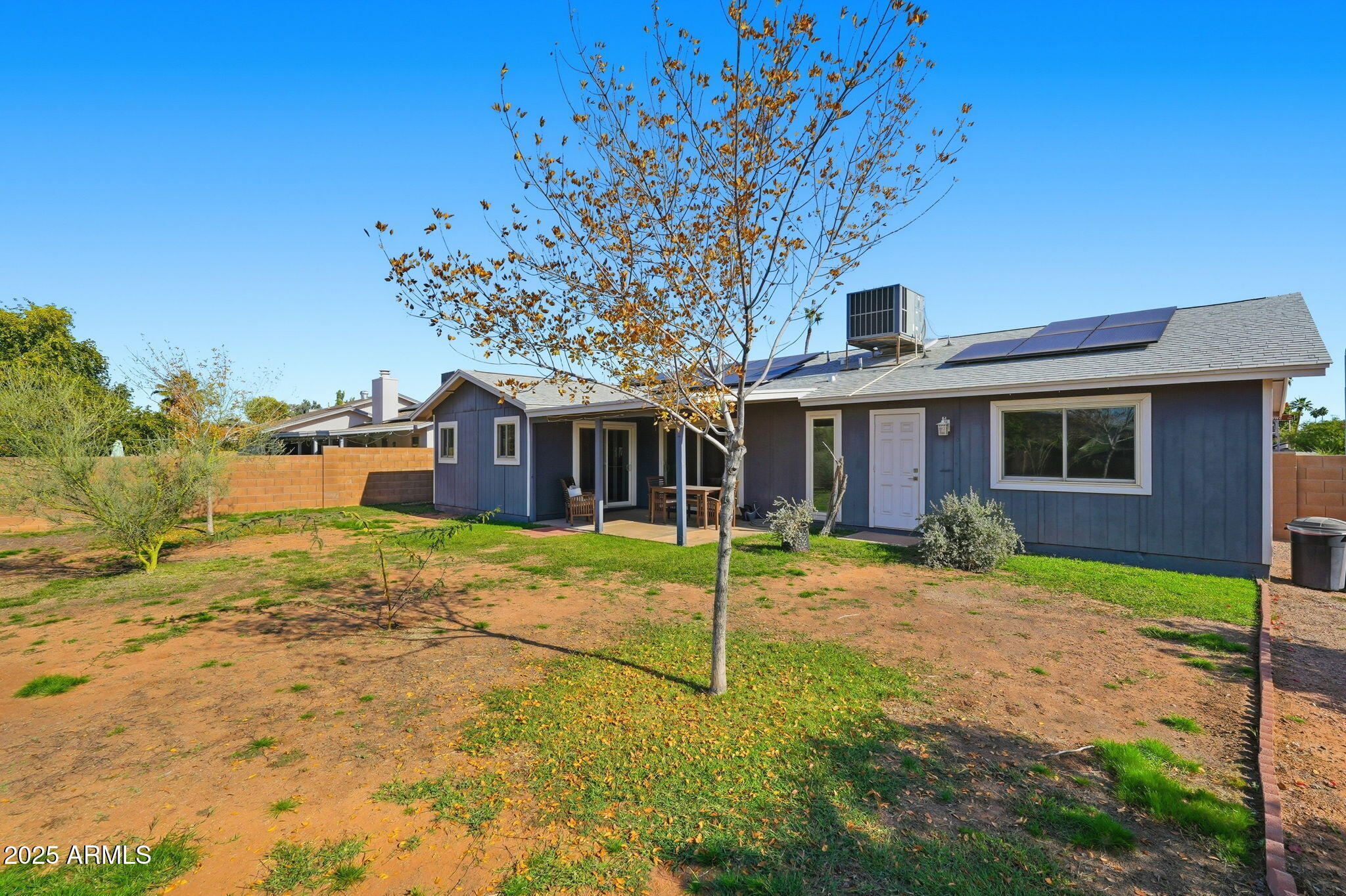 1504 North Iowa Street Chandler, AZ 85225 - Photo 34 of 34 a view of a house with a yard