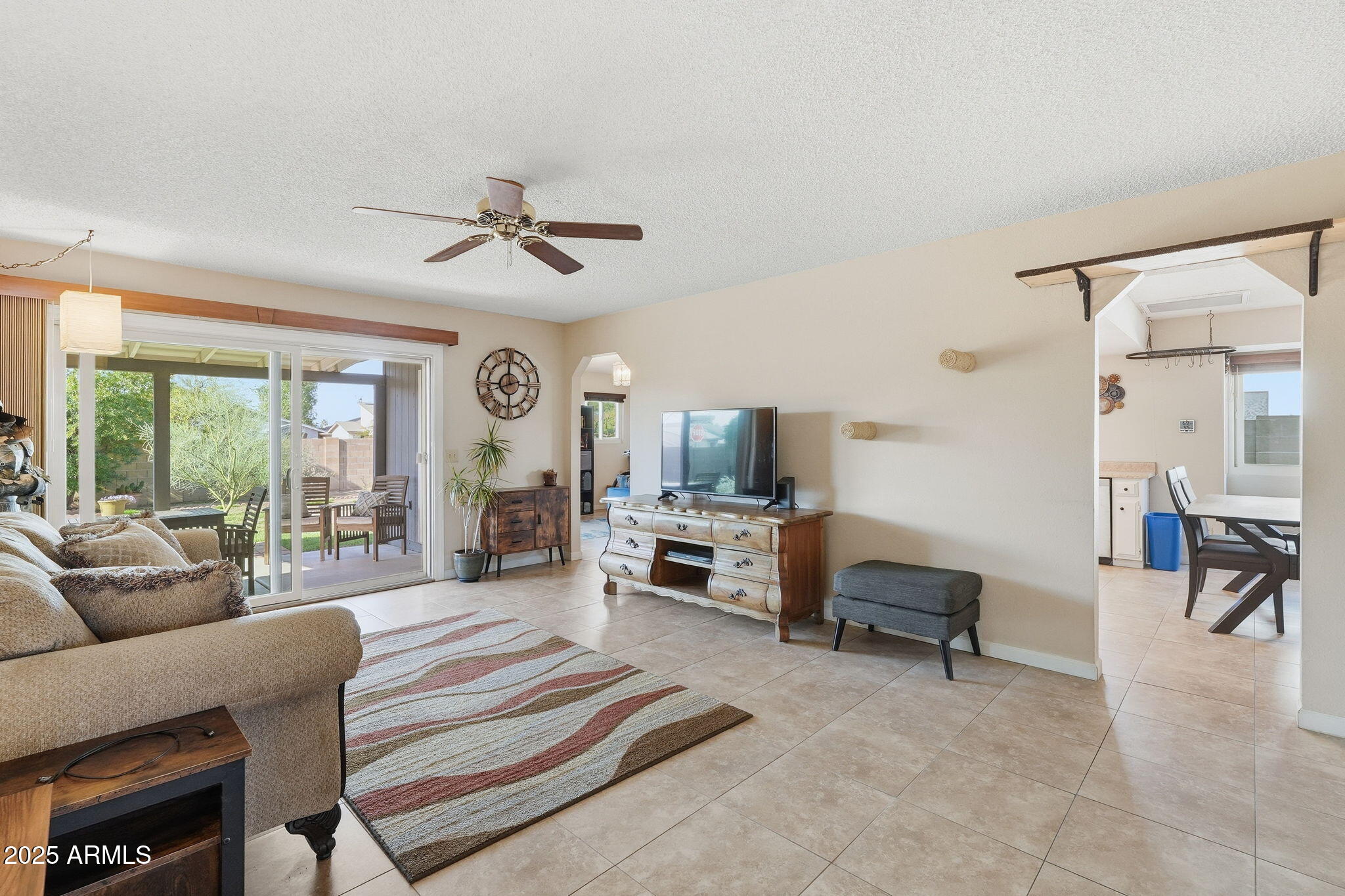 1504 North Iowa Street Chandler, AZ 85225 - Photo 5 of 34 a living room with furniture and a flat screen tv