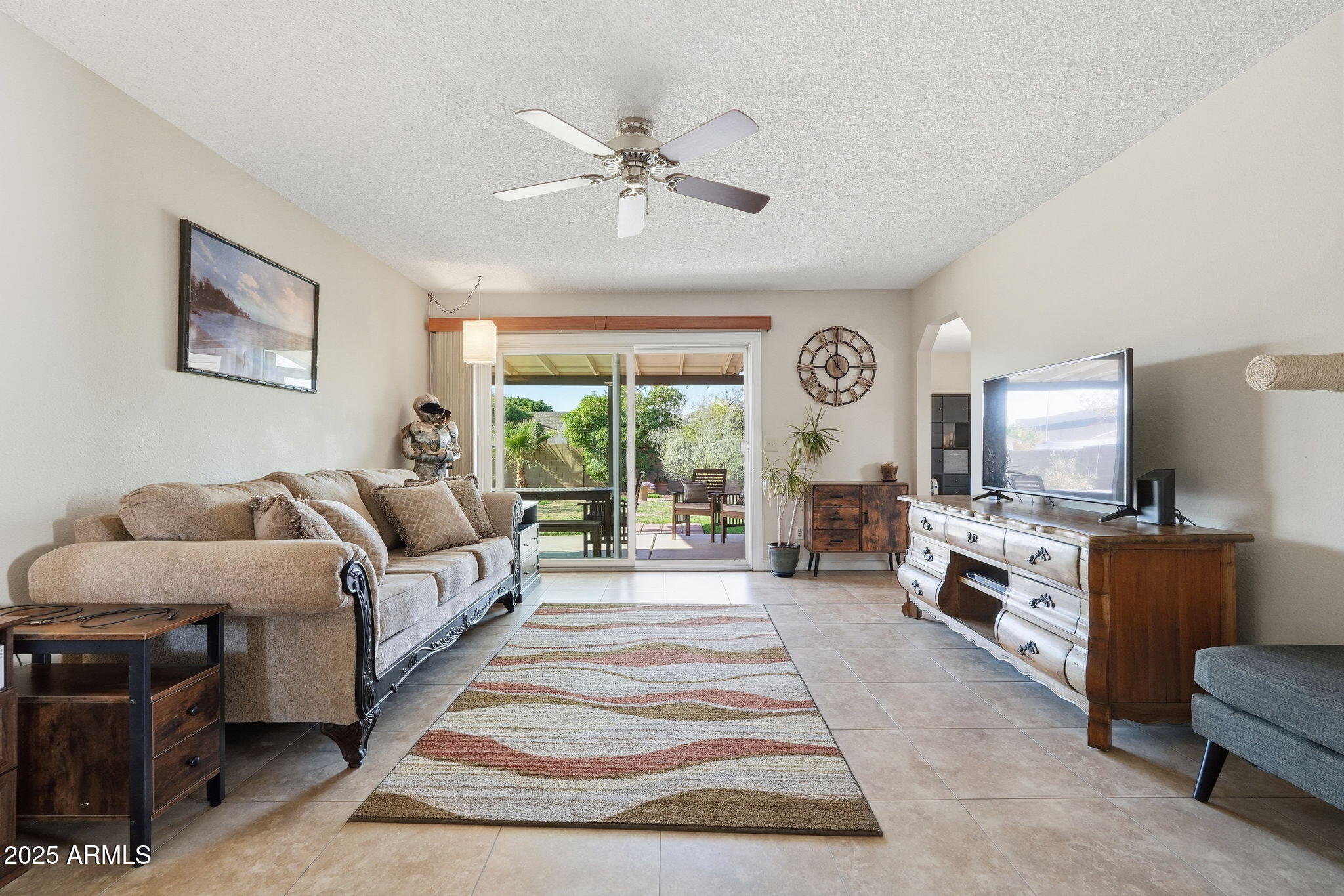 1504 North Iowa Street Chandler, AZ 85225 - Photo 6 of 34 a living room with furniture and a large window