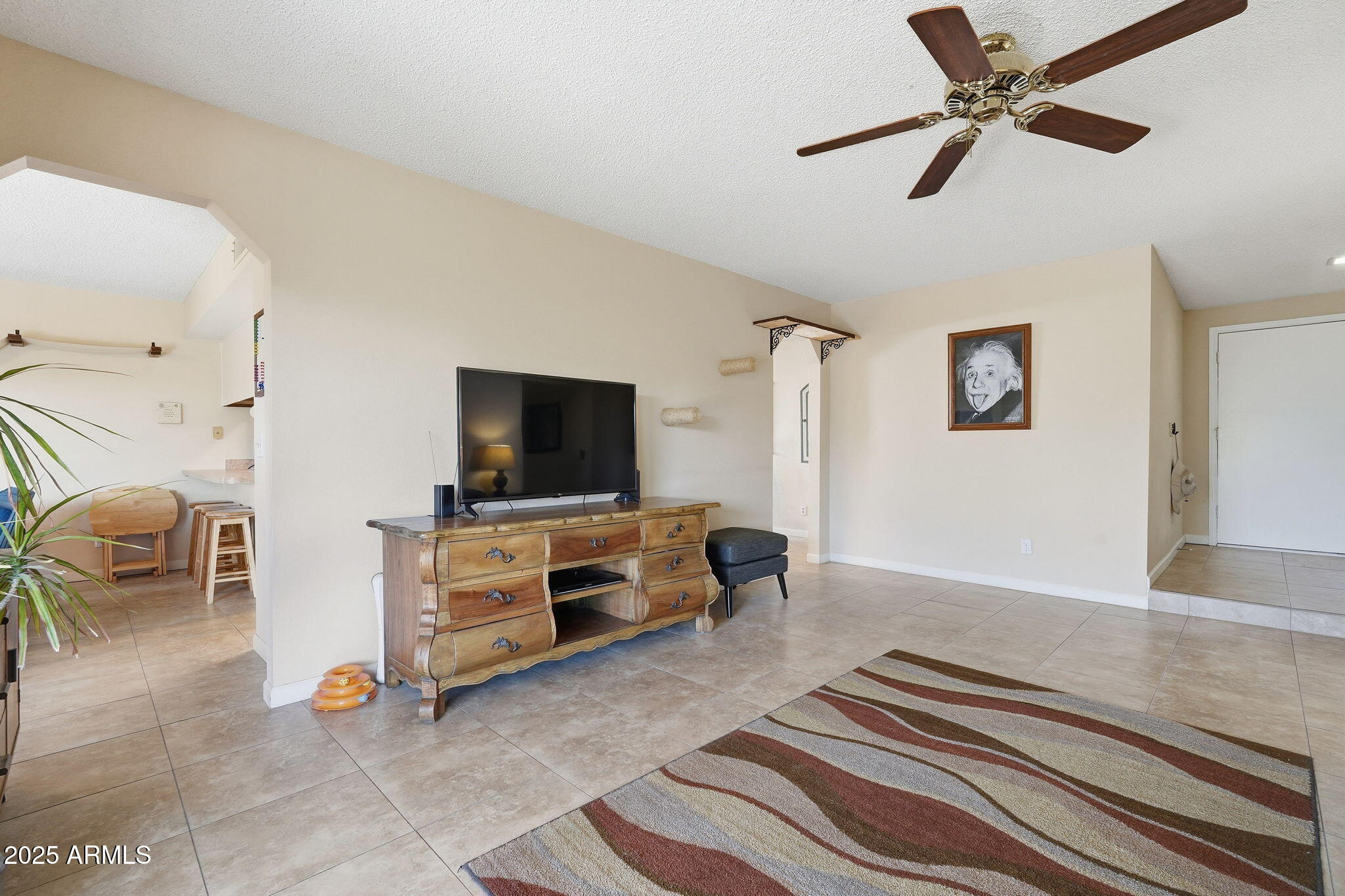 1504 North Iowa Street Chandler, AZ 85225 - Photo 9 of 34 a view of a livingroom with furniture and a flat screen tv