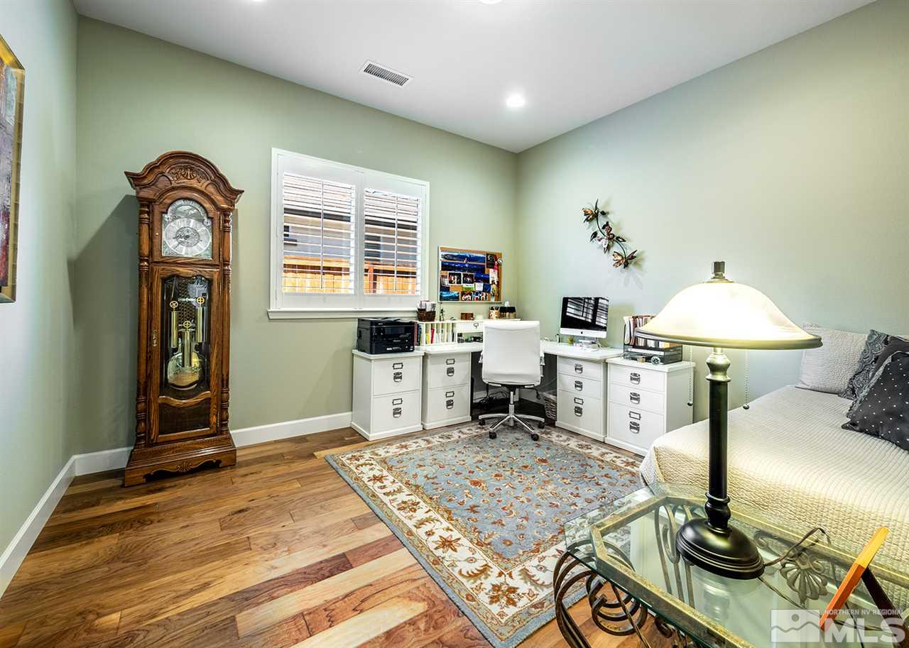 9360 Chalkstone Way Reno, NV 89523 - Photo 20 of 26 a living room with furniture a rug and a window
