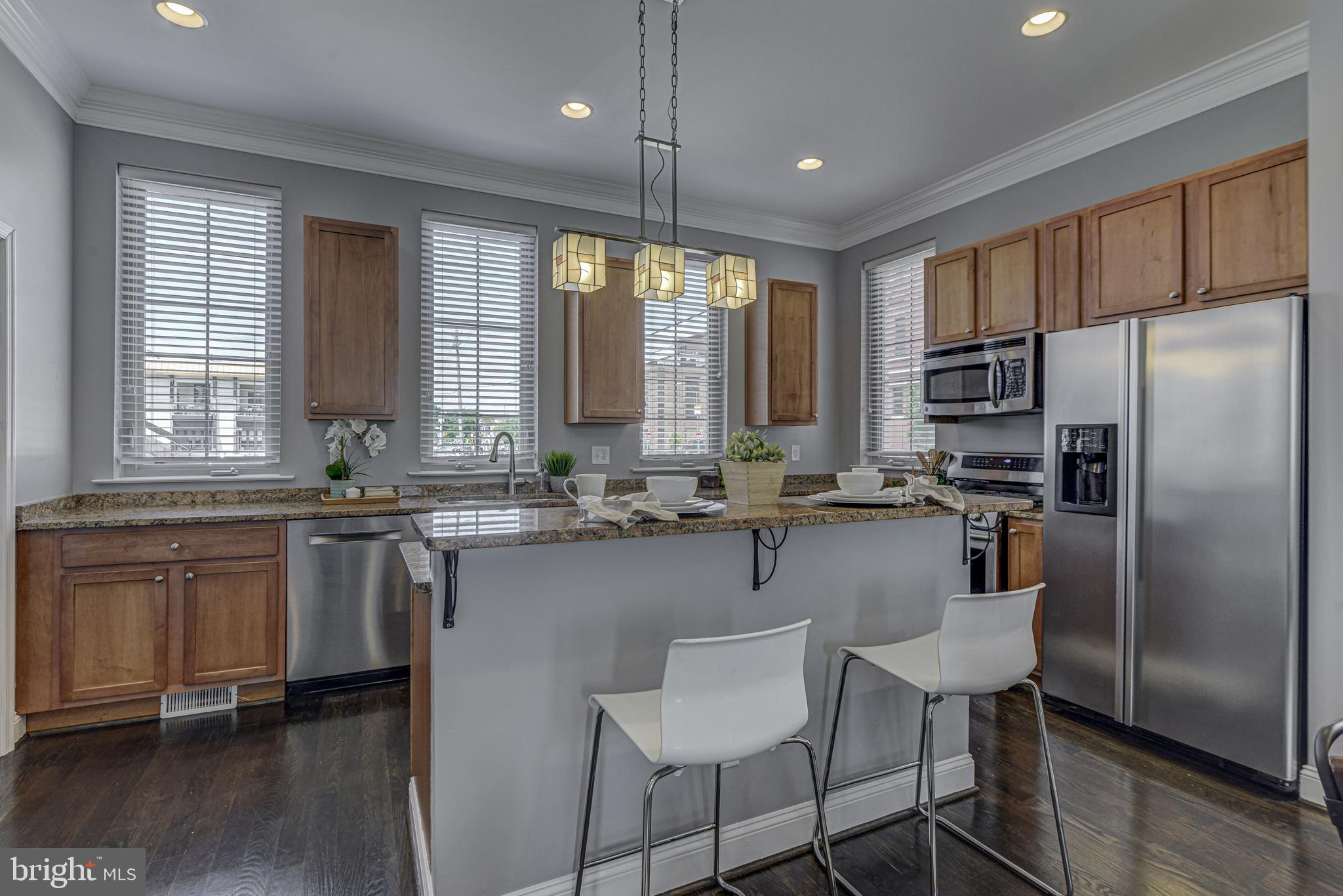 1016 South Conkling Street, Unit A Baltimore, MD 21224 - Photo 19 of 50 Kitchen w/ breakfast bar