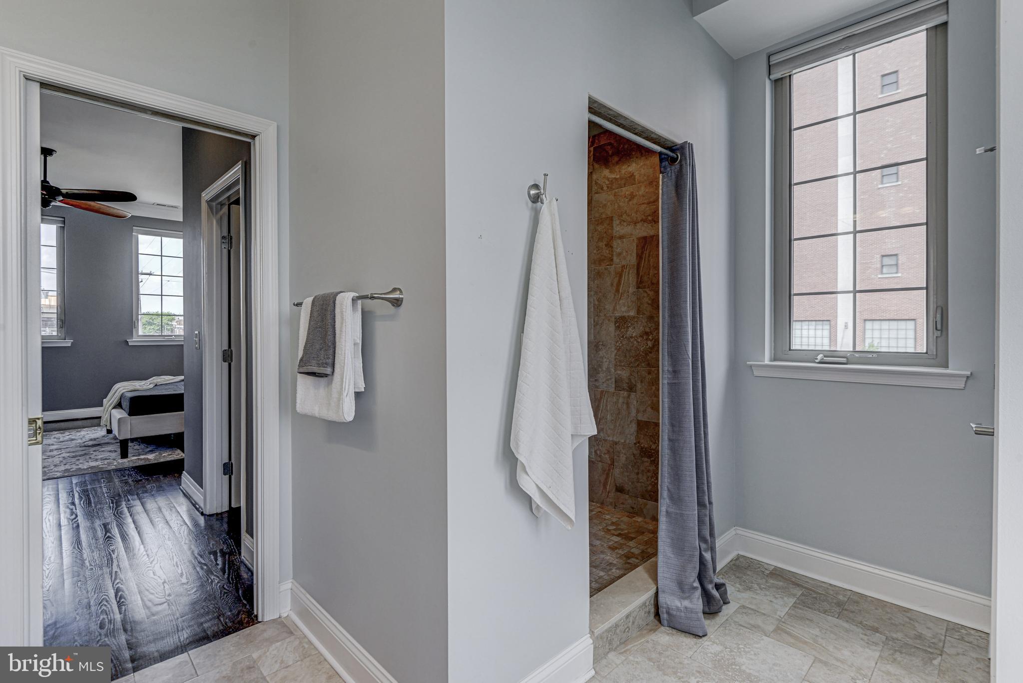1016 South Conkling Street, Unit A Baltimore, MD 21224 - Photo 36 of 50 Master Bath w/ sep stand-up shower