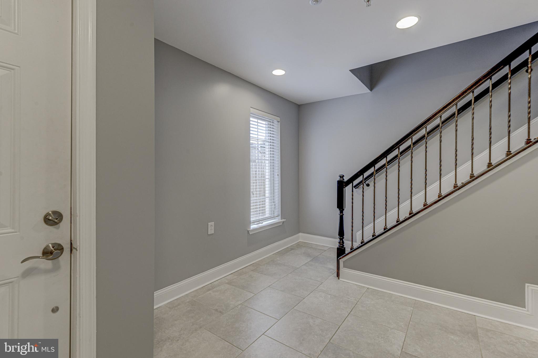 1016 South Conkling Street, Unit A Baltimore, MD 21224 - Photo 4 of 50 Front entrance to Foyer