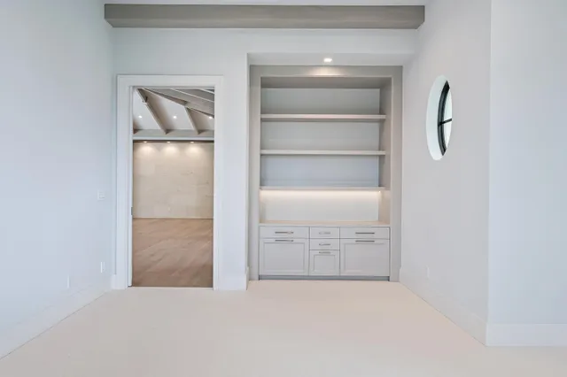 a view of an empty walk in closet