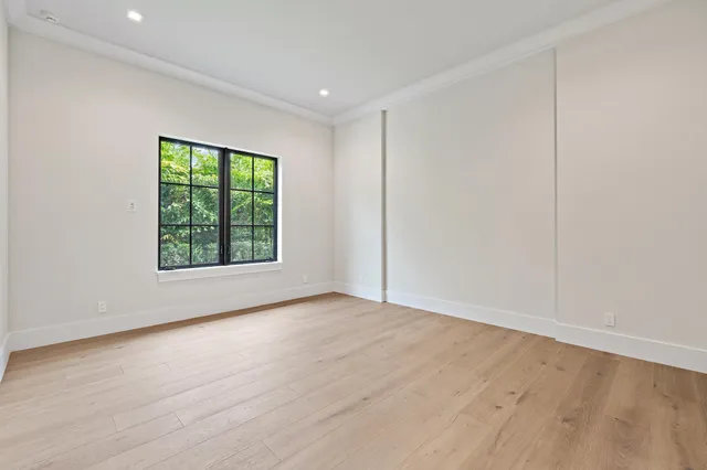 a bathroom with a toilet sink and shower