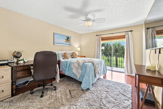 a view of a hallway with a white walls