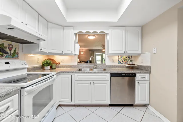 a couple of cars parked in front of buildings