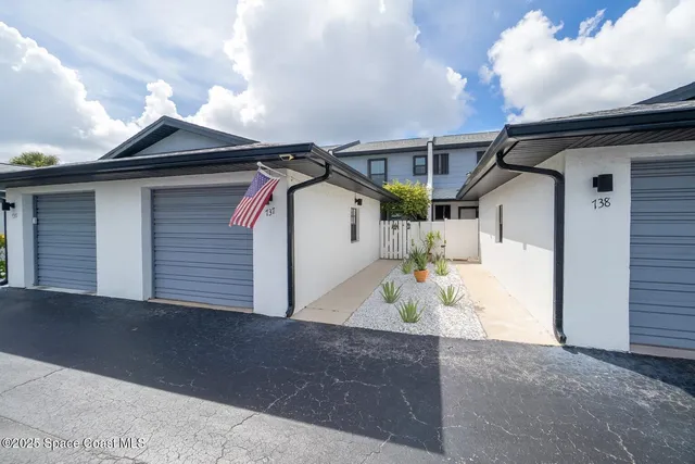 a view of balcony with furniture
