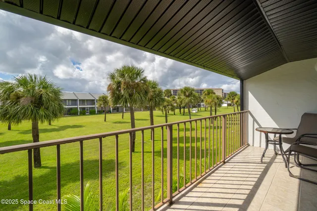 a bath tub sitting next to a shower