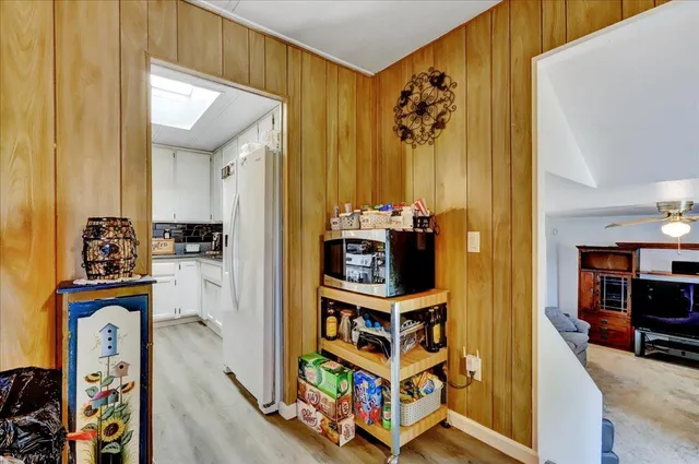 a view of a bedroom with workspace