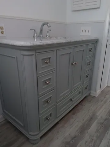 a bedroom with bed and window