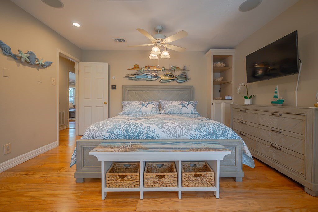 9 Sandra Drive Fulton, TX 78382 - Photo 27 of 35 a bedroom with a bed and a flat screen tv