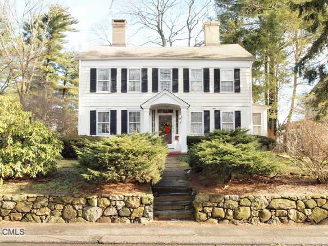 80 Brookside Road Darien, CT 06820 - Photo 1 of 1 a front view of a house with a garden