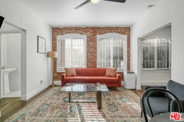 a view of room with window and furniture