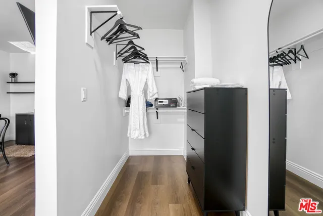a kitchen with a refrigerator and a sink