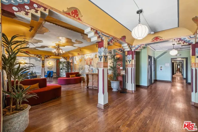 a view of a living room and a room