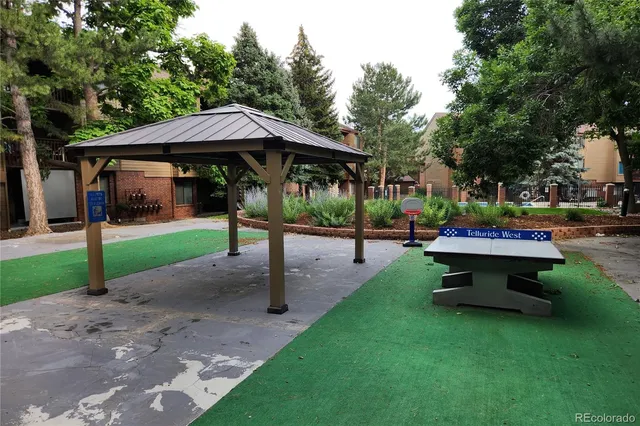 a childrens park with lots of swings and slides