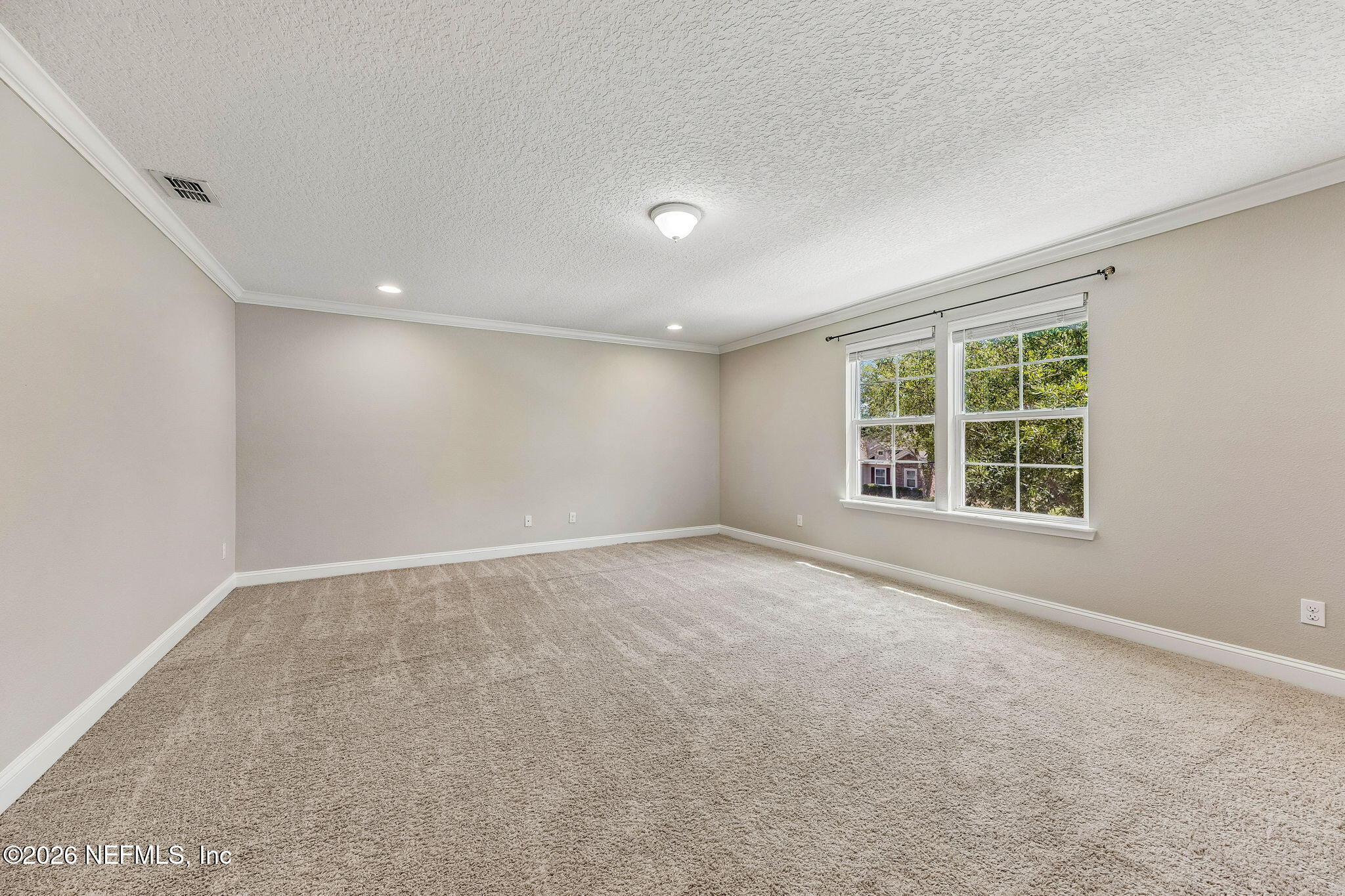 12198 Ridge Crossing Way Jacksonville, FL 32226 - Photo 24 of 67 a view of an empty room with a window