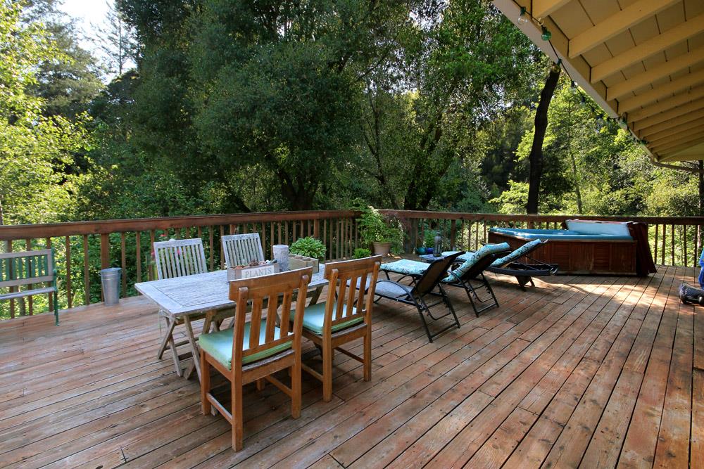 1 Oak Road Santa Cruz, CA 95060 - Photo 4 of 25 a balcony with wooden floor table and chairs