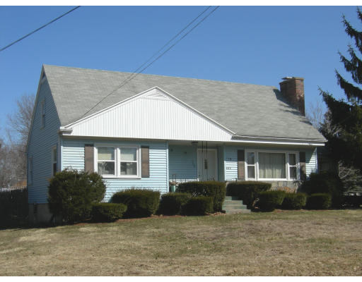 900 Morgan Road West Springfield, MA 01089 - Photo 1 of 10 a house that has a large tree in front of it