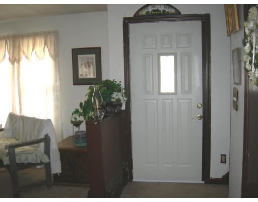 900 Morgan Road West Springfield, MA 01089 - Photo 2 of 10 a living room with furniture and a potted plant